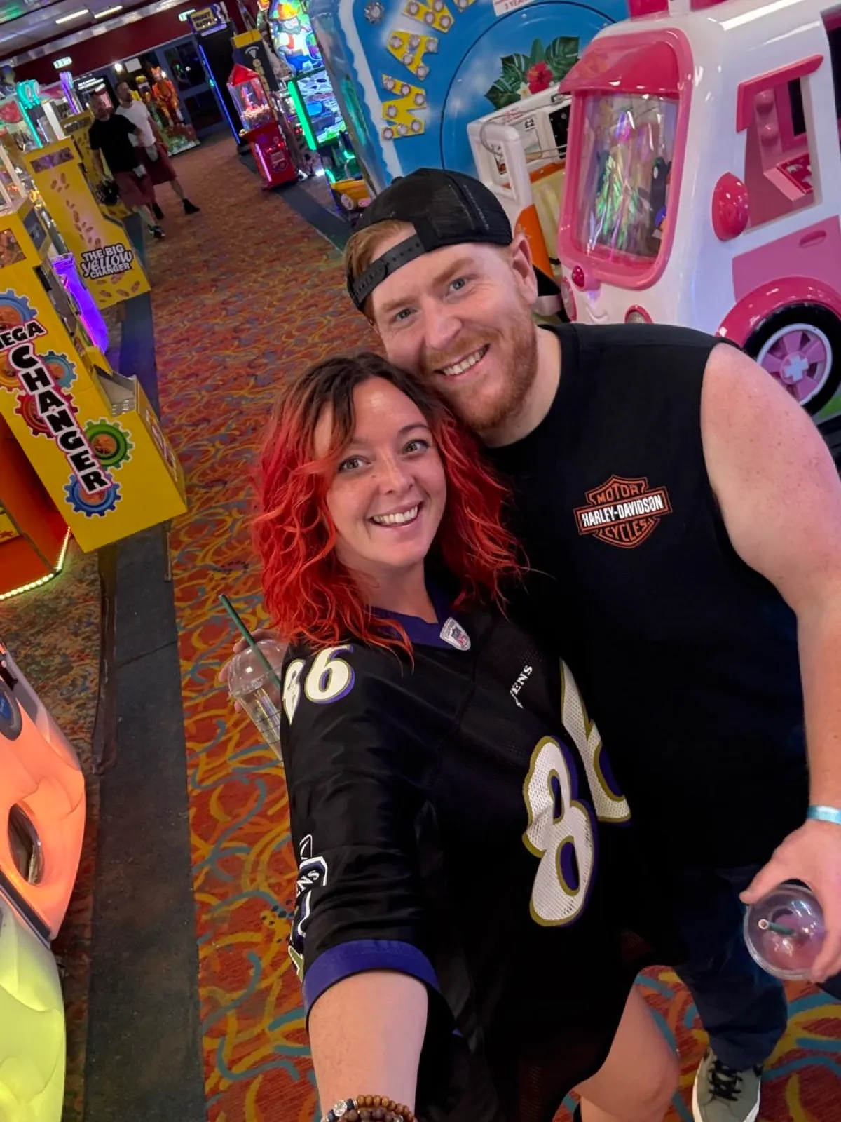 The two of us with drinks in the Butlins Skegness arcade during the 90s Reloaded Big Weekender