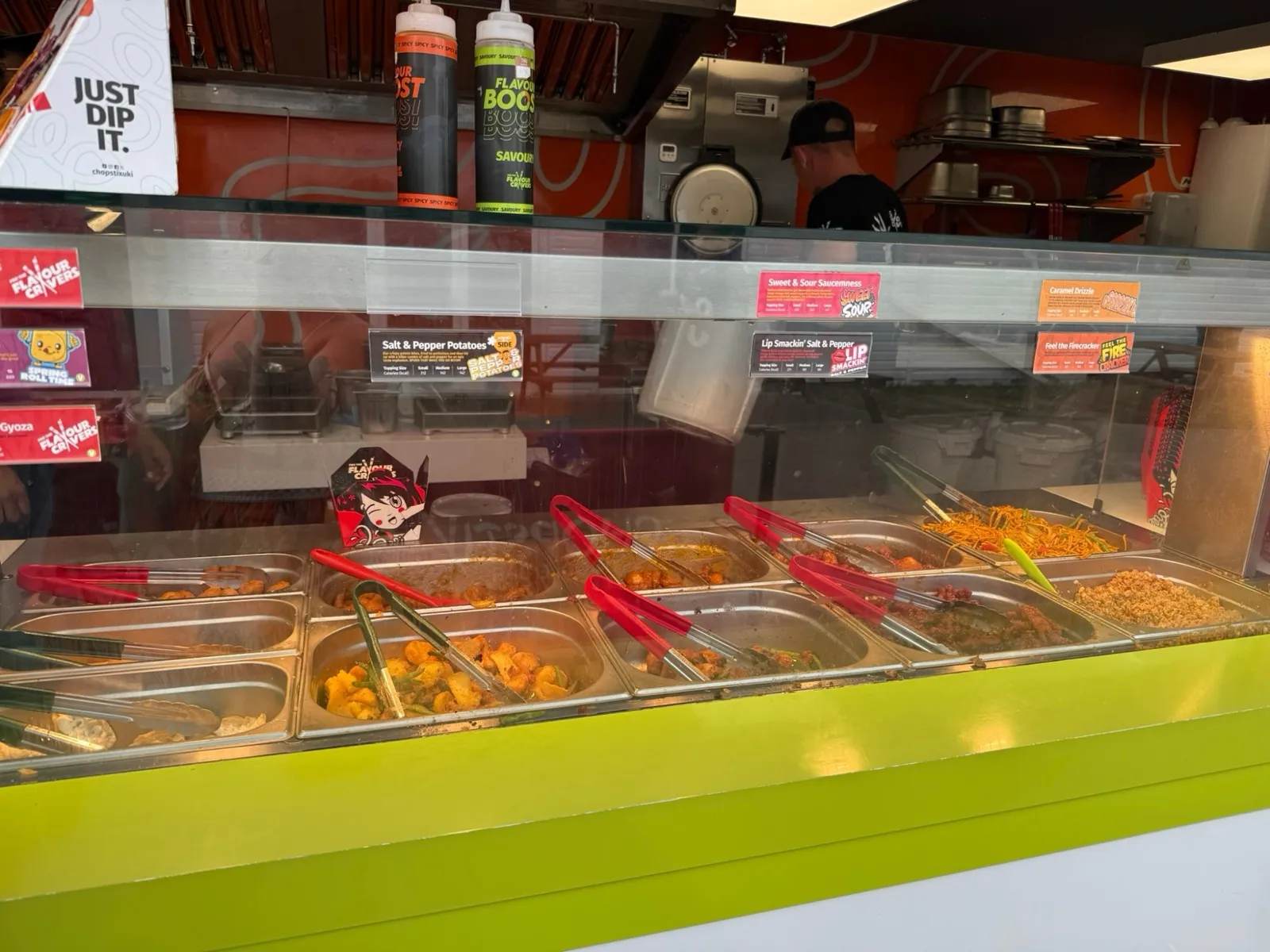 Hot food trays behind the glass at the Chopstix counter at Butlins Skegness