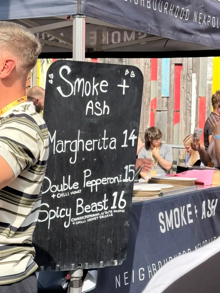 Smoke + Ash chalkboard menu: Margherita 14, Double Pepperoni with chilli honey 15, Spicy Beast with chorizo, pepperoni and n'duja sausage plus chilli honey drizzle 16
