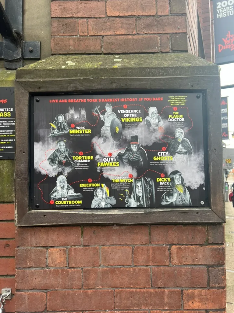The board outside the York Dungeon showing its ten shows, including Vengeance of the Vikings, The Plague Doctor, Guy Fawkes, the Torture Chamber and Curse of the Witch
